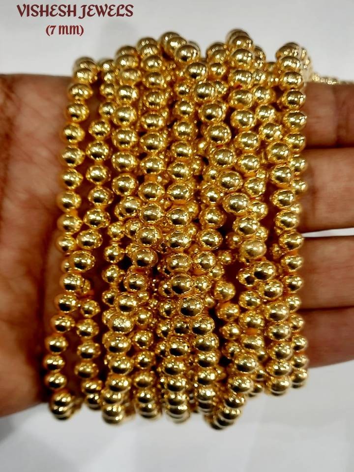 GOLD WAX FILLED BEADS 7mm